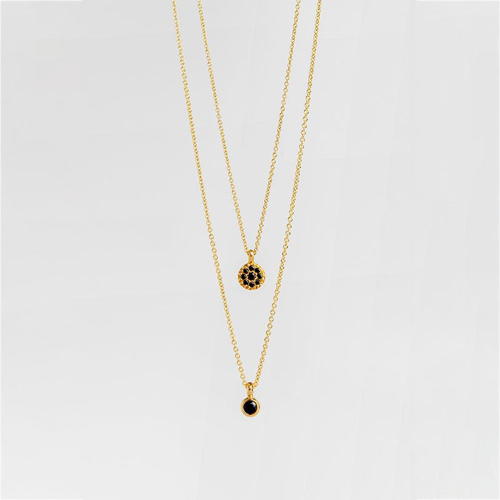 תליון טיקה שחורה